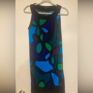 Women’s Floral Dresss colors purple blue green black, size medium used $5.00